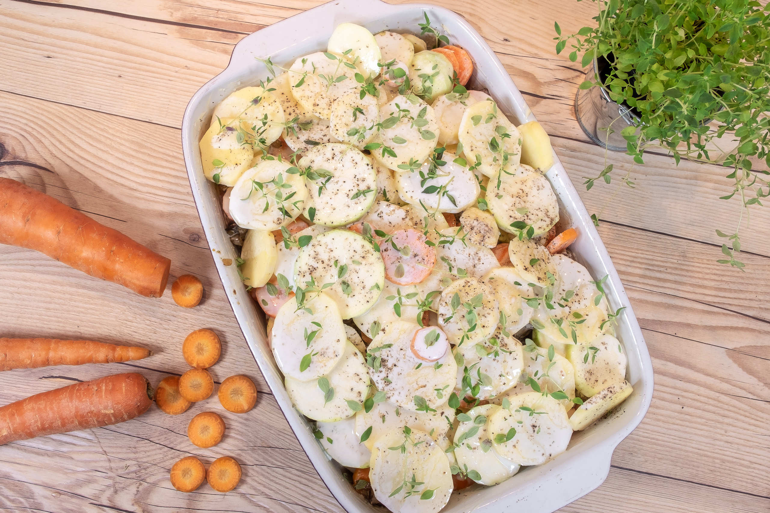 Zucchinigratäng med potatis och timjan