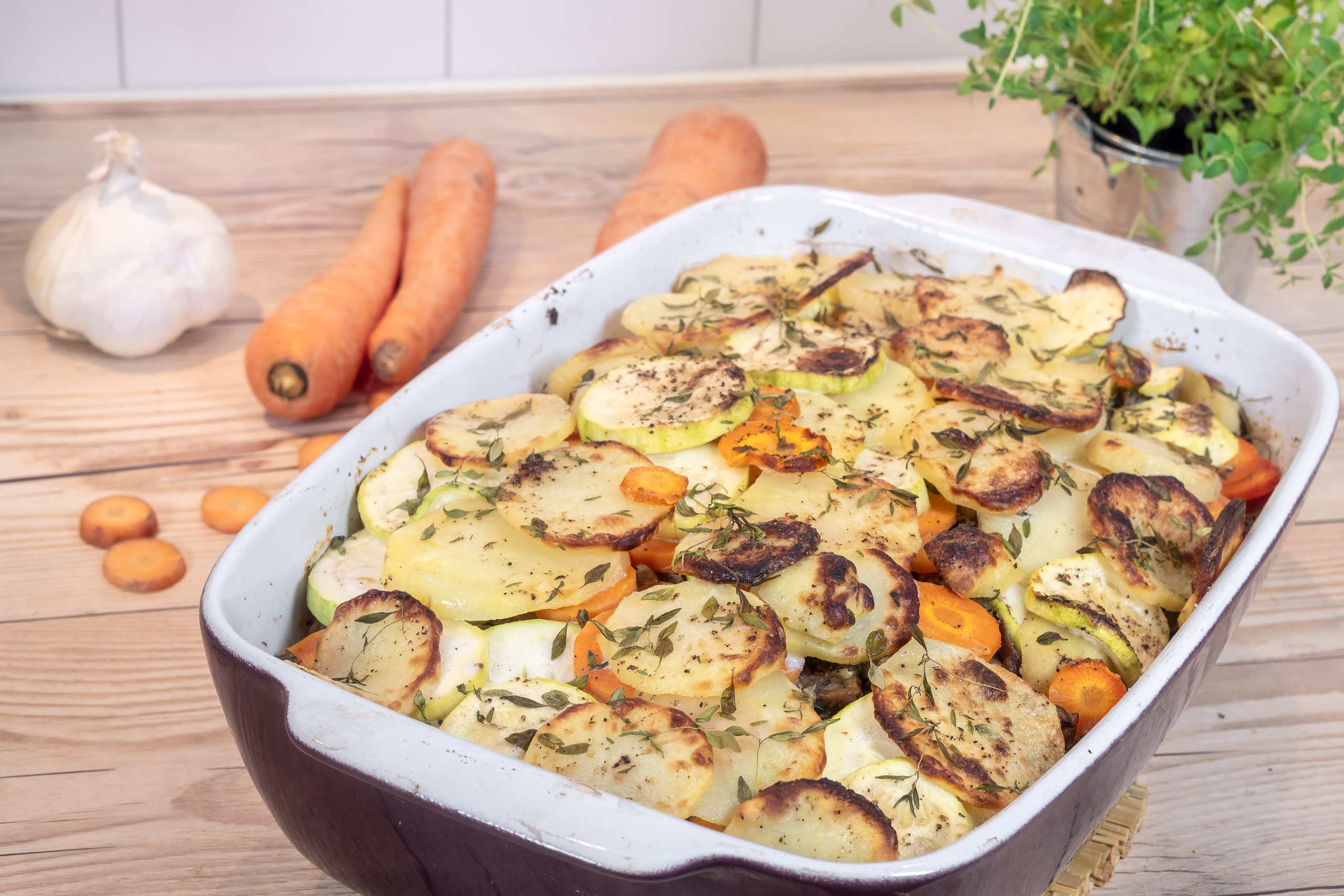 Zucchinigratäng med potatis och timjan