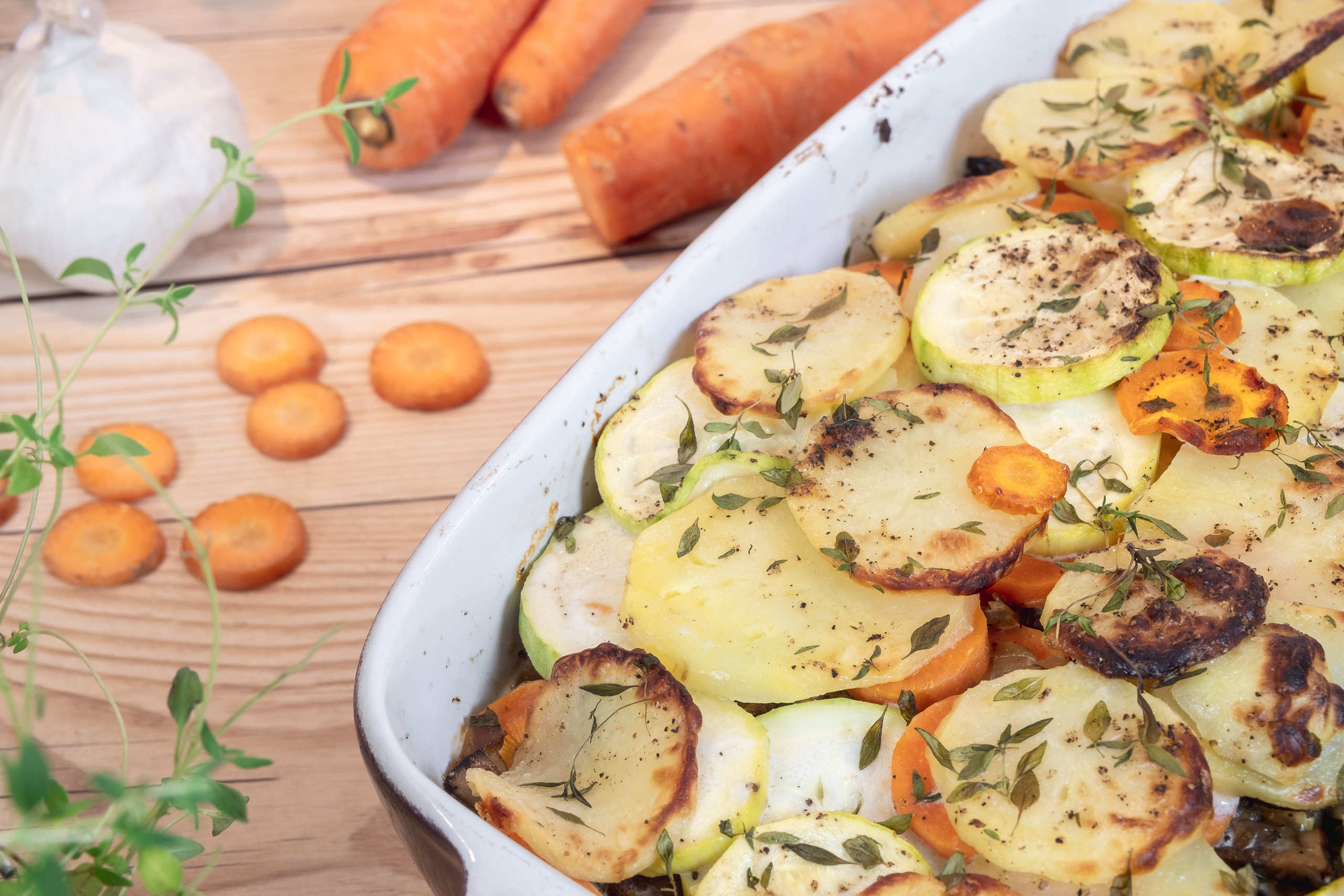 Zucchinigratäng med potatis och timjan