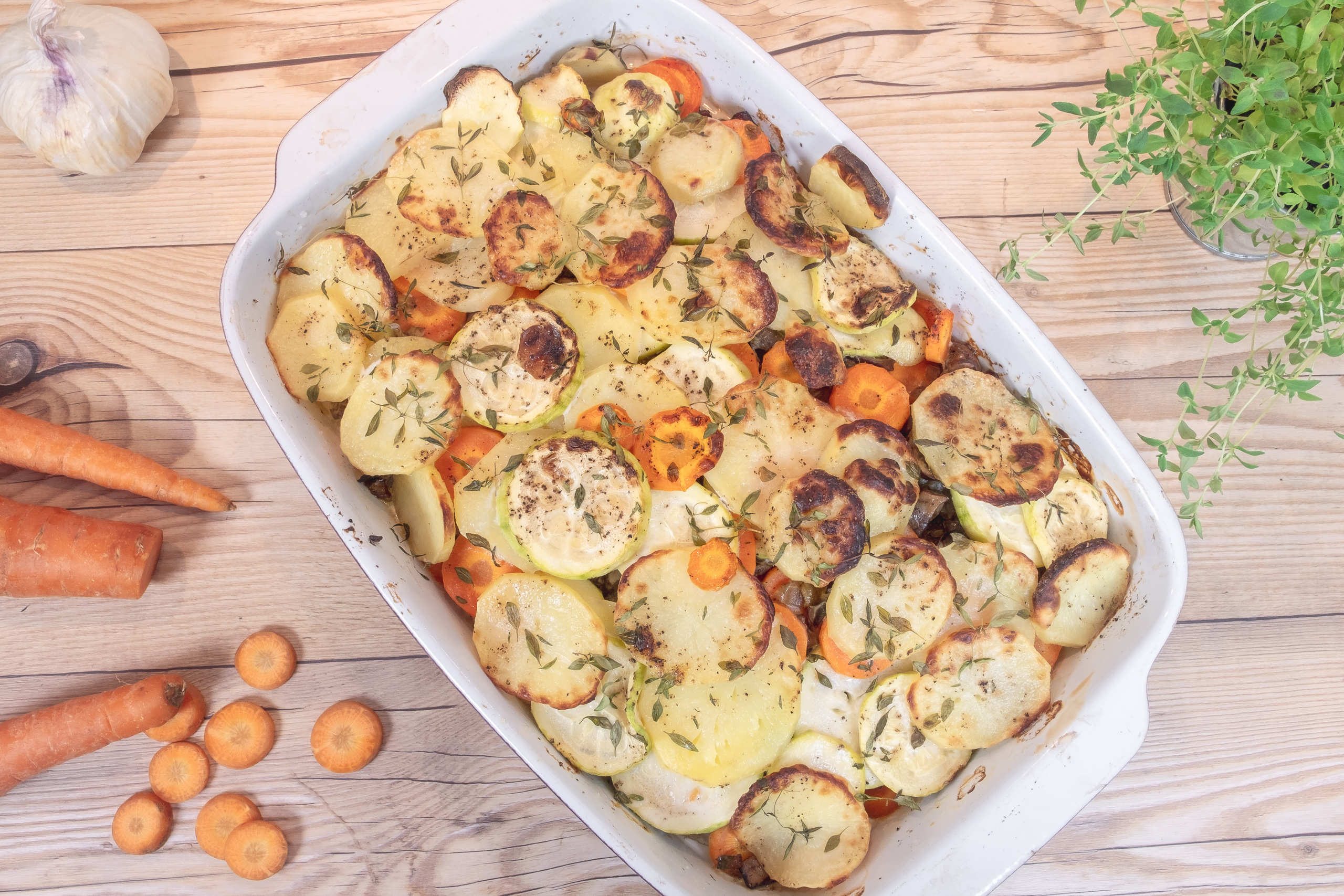 Zucchinigratäng med potatis och timjan